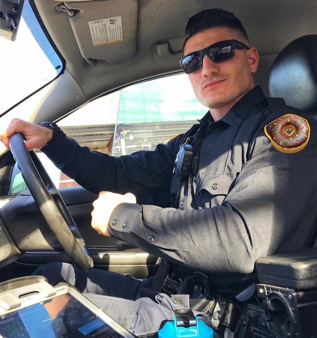 sexy-american-male-cop-masculine-uniformed-police-officer-driving-car
