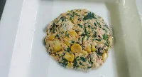 Corn spinach patty dipped in batter for corn spinach burger recipe