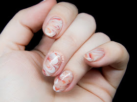 Peachy marbled stone nail art by @chalkboardnails