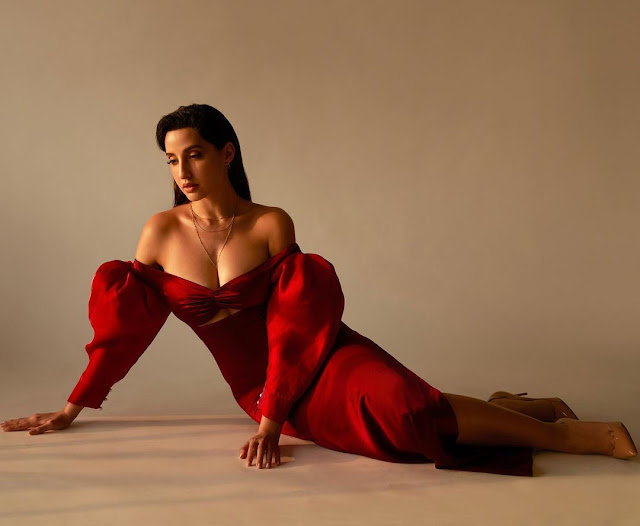 Nora Fatehi sets internet ablaze with her super HOT in red off-shoulder dress Nora Fatehi sets internet ablaze with her super HOT in red off-shoulder dress