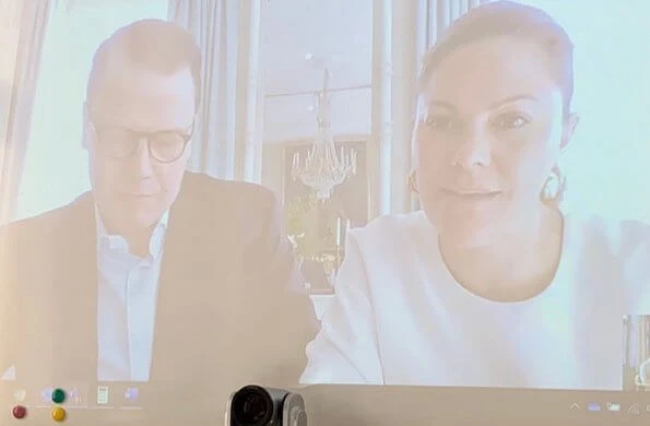 Crown Princess Victoria and Prince Daniel made a digital visit to the Norra Real high school. Victoria wore a silk top