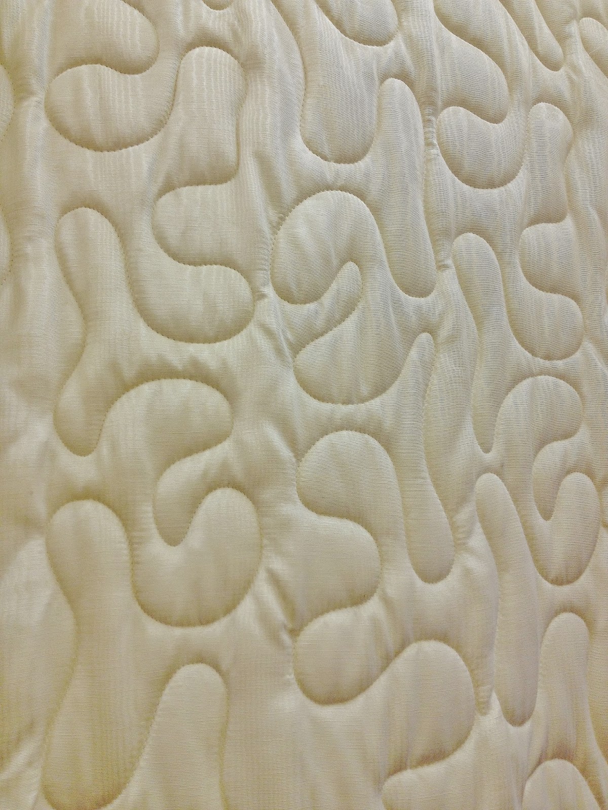 Decor Dreams & Schemes The art of quilting on bedspreads and beyond.