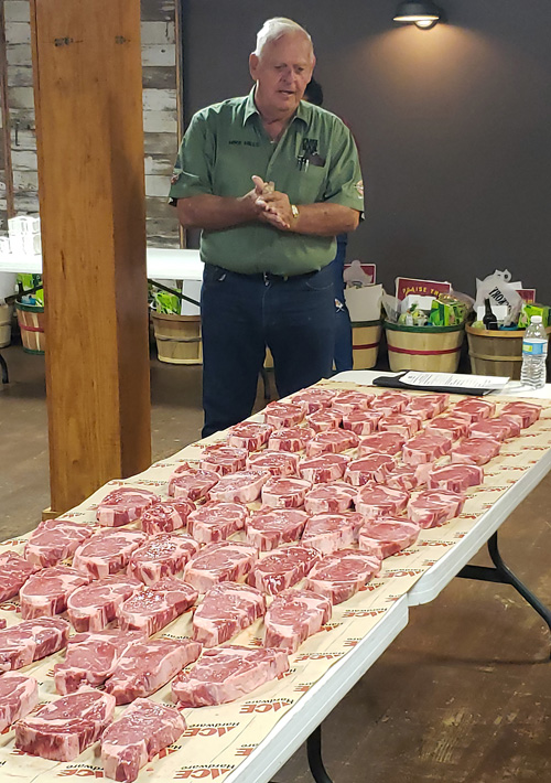 Mike Mills opening the steak contest meeting at 2019 Praise The Lard BBQ Contest