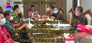 Bupati Lambar Melalui Vidio Confrence (vidcon)Rapat Koordinasi Program Pencegahan Korupsi Terintegrasi 2021 1 InShot 20210220 212051420