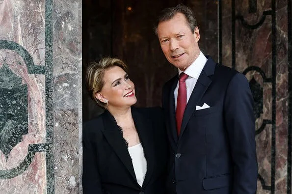 Grand Duchess Maria Teresa wore a new black open sleeves lace trimmet viscose crepe jacket from Alexander McQueen