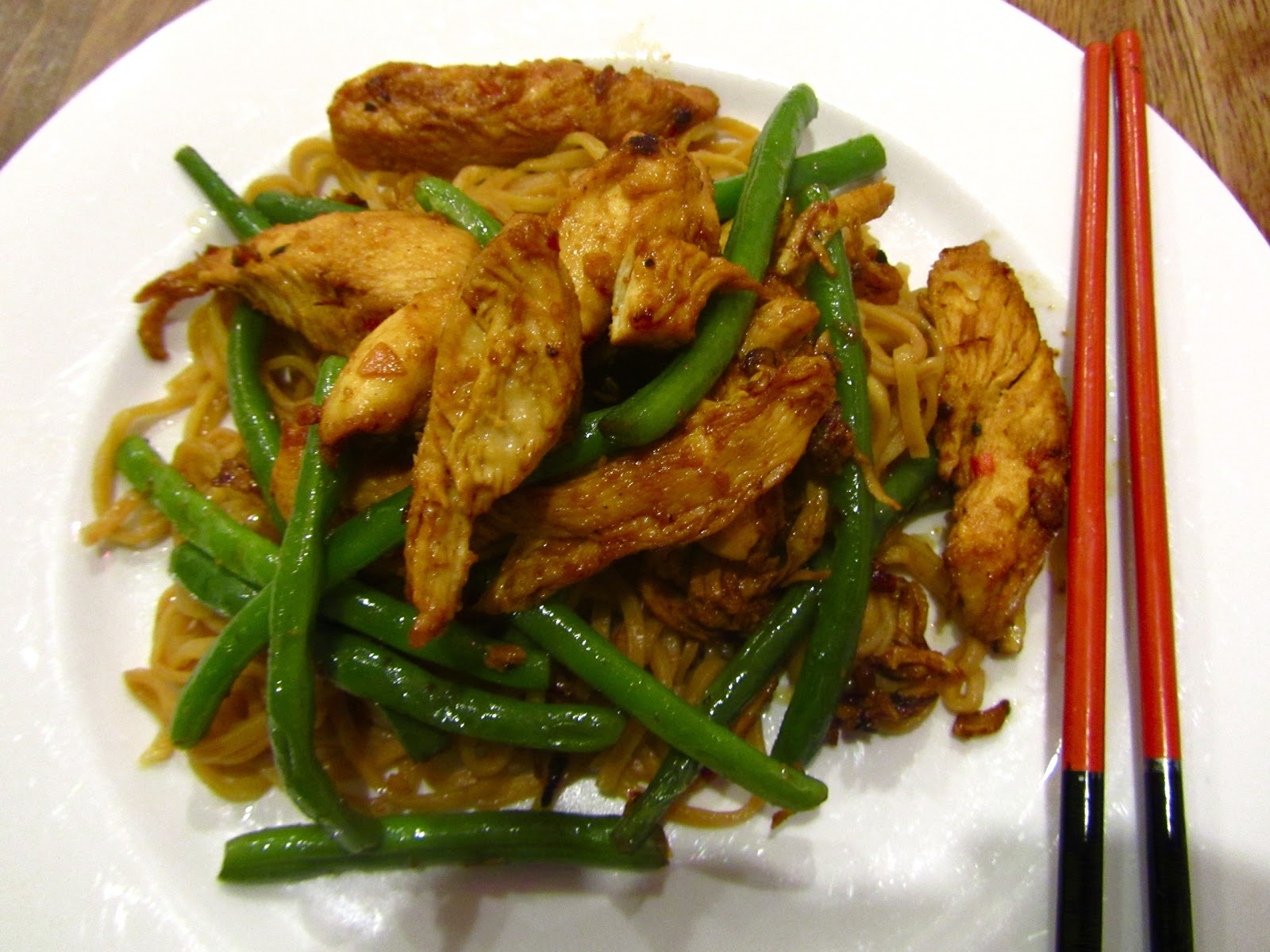 Stir fried chicken with ginger, chilli, garlic and lime