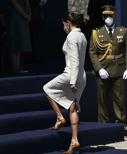 Queen Letizia wore a dress by Felipe Varela for baptism ceremony of Princess Leonor. Carolina Herrera authentic handbag