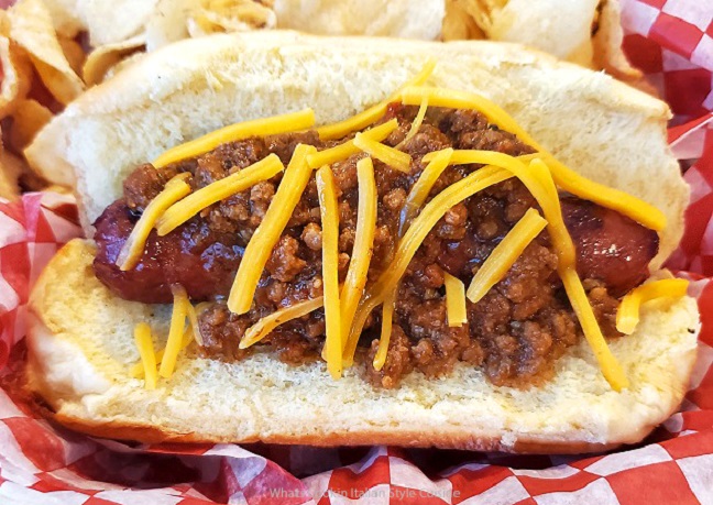 Hot Dog Chili this is a chili cheese hot dog with salt and vinegar chips on a red and white check