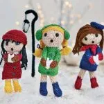 http://www.letsknit.co.uk/free-knitting-patterns/merry-christmas-carolers