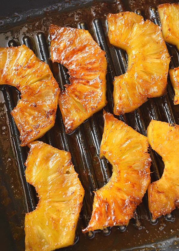 delicious grilled pineapple slices cooked in a grilling pan