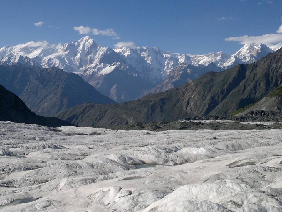 Minapin Glacier in Hunza valley. view of peak Batura Wall, Sangemarmar Sar 6990 m,Pasu Sar E (Pasu Diar) 7295 m, Rishi Choti 6766 m and cloud over Shishpare Sar 7611 m. Peak in Hunza valley and Batura Muztagh Karakoram range Hunza valley.