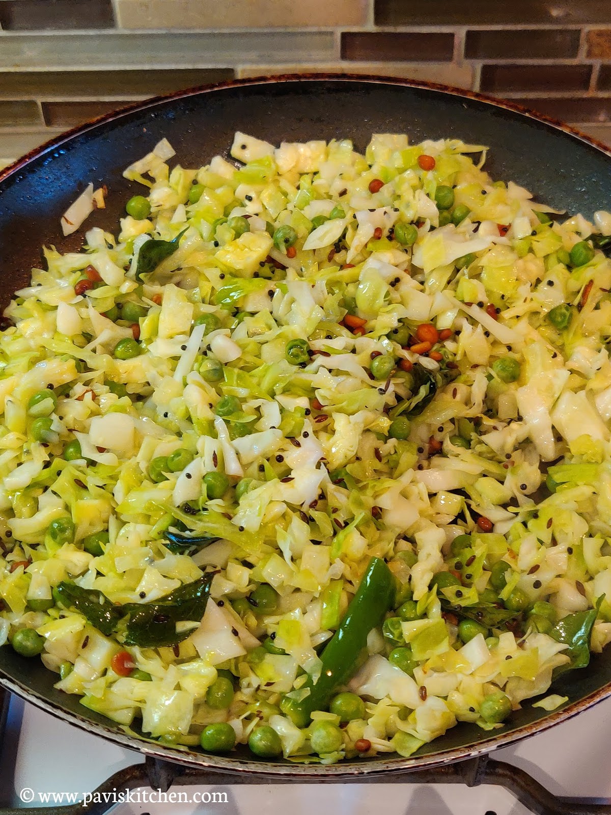 cabbage poriyal recipe cabbage peas poriyal muttaikose poriyal