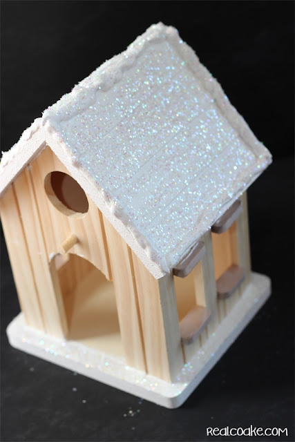 A DIY Christmas Craft to make a cute wood Gingerbread House from realcoake.com