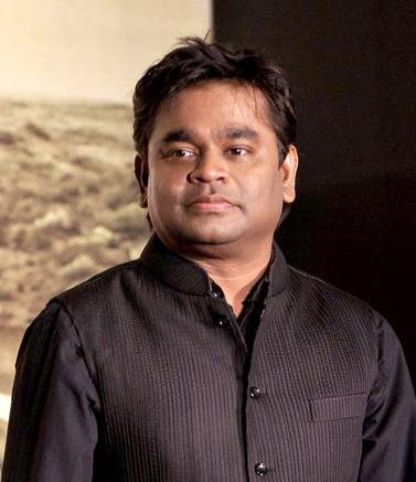 A R Rahman posing for camera