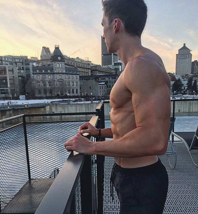 shirtless-muscular-guy-abs-enjoying-incredible-city-view