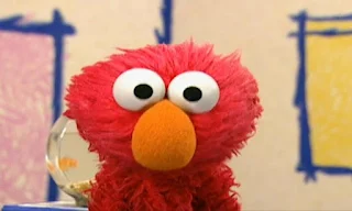 Elmo presents Sesame Street Elmo's World Eyes. Guess what Elmo's thinking about today