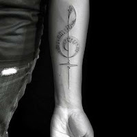 tatuaje musica clave de sol