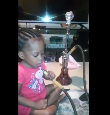 1 Video: Watch as a litle girl is given shisha to smoke by adults