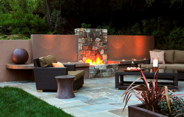covered outdoor living spaces with fireplace