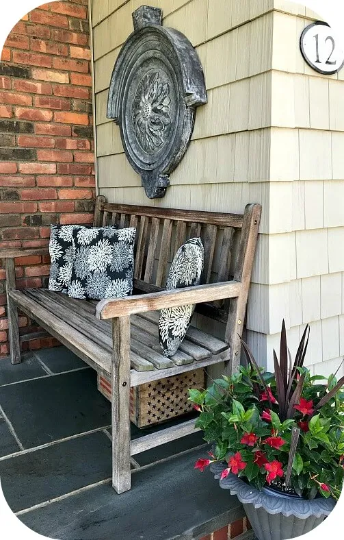 teak bench on front porch
