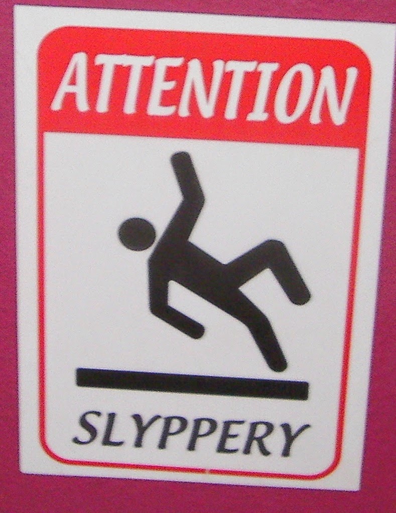 attention slyppery safety warning sign fail starfish glass bottomed boats porto colom to cala figuera majorca spain