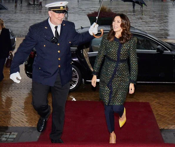 Crown Princess Mary wore a tweed coat from Prada, and yellow suede pumps from Gianvito Rossi