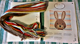 The rabbit cross stitch pattern and wool.