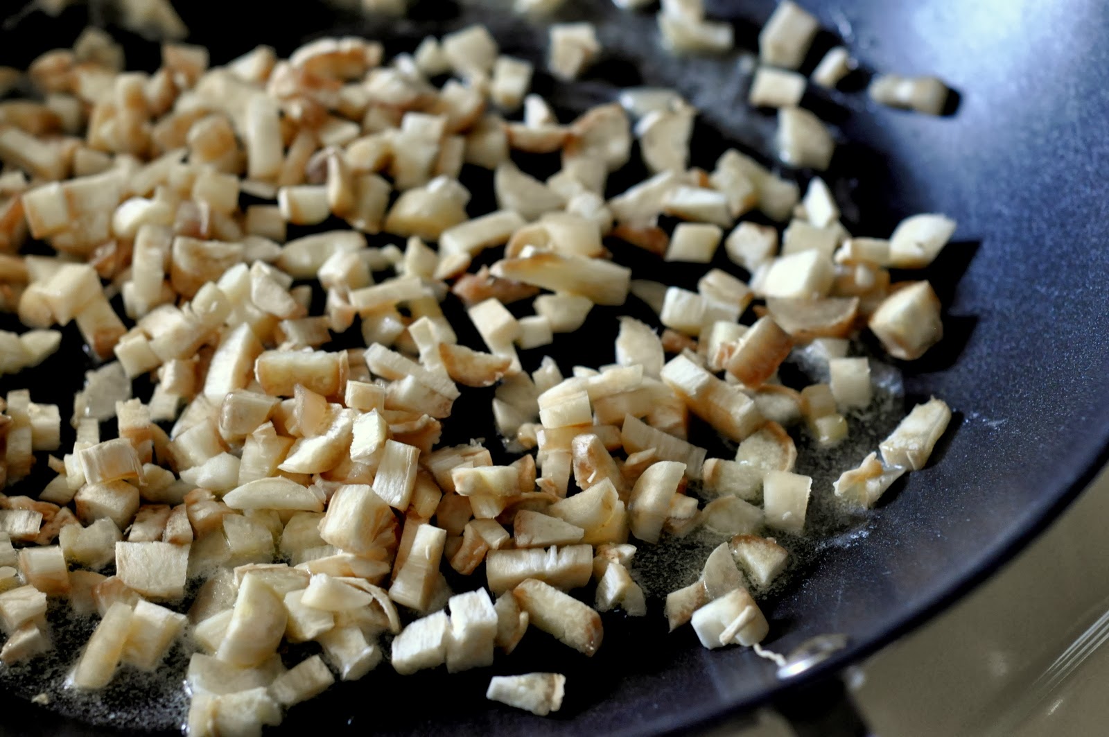 Chopped Mushroom Stems in Melted Unsalted Butter | Taste As You Go