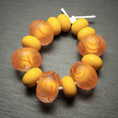 Tumble-etched lampwork glass beads by Laura Sparling