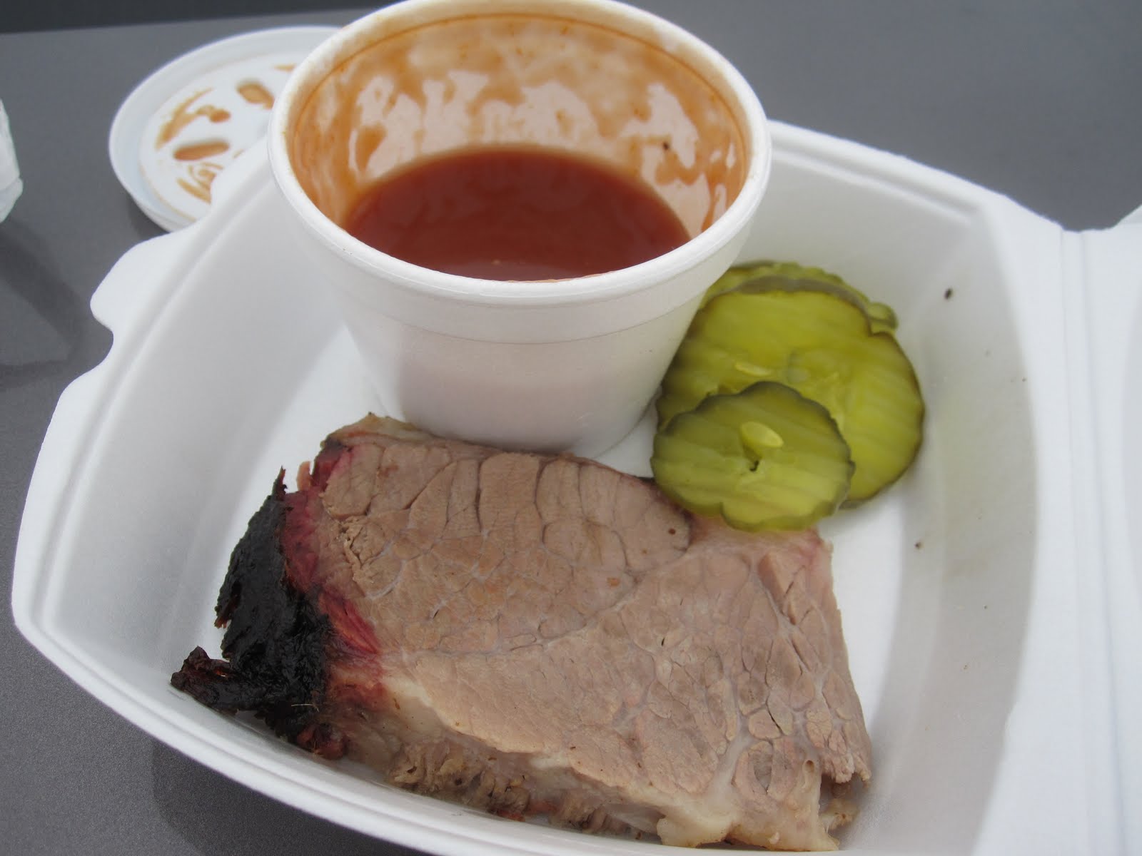 Man Up Tales of Texas BBQ™ Brisket at Cowpokes BarBQ (Pearsall, TX)