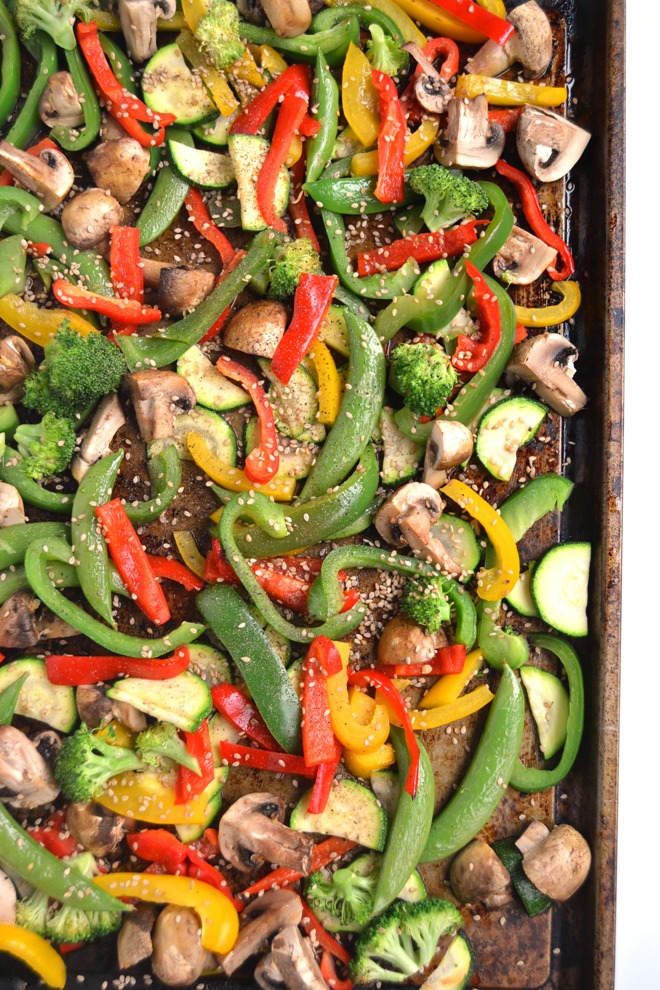 Asian Roasted Vegetables features a mix of bell peppers, zucchini, peapods, mushrooms and broccoli with a sesame-soy dressing that makes the perfect side dish! www.nutritionistreviews.com