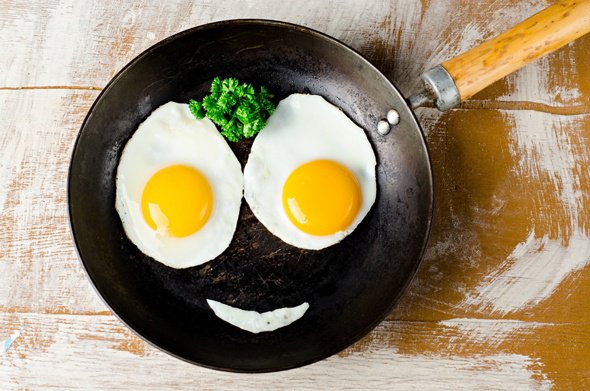 A Healthy Breakfast Fried-eggs-on-pan-made-into-smiley-face