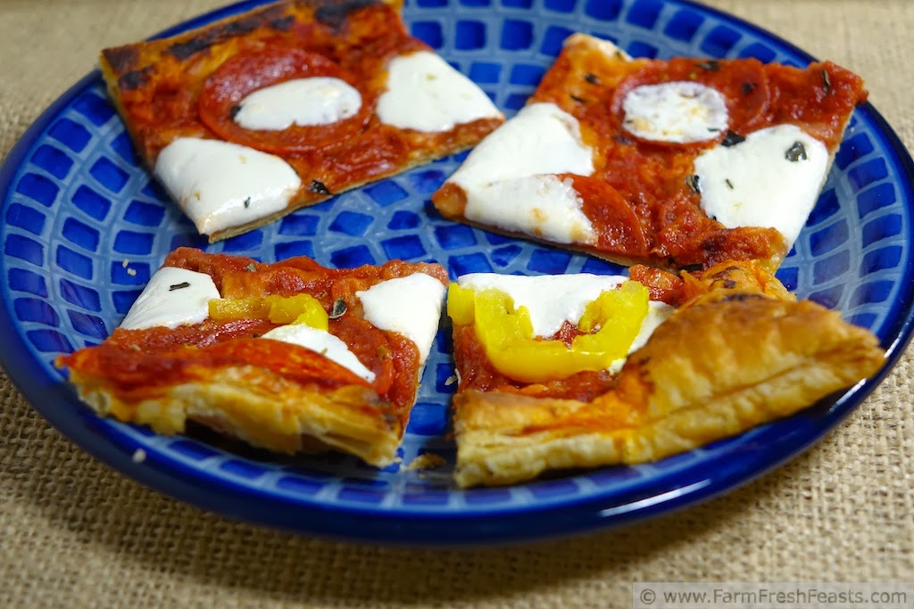 Pickled Pepper and Pepperoni Puff Pastry Pinwheel Pizzas http://www.farmfreshfeasts.com/2014/01/pickled-pepper-and-pepperoni-puff.html A recipe for pepperoni pizza flavor inexpertly rolled into individual pinwheel pizzas, this makes an easy to eat appetizer.