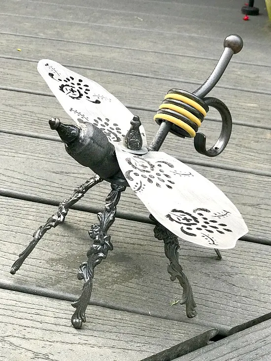 DIY yellow and black repurposed garden bee