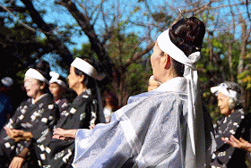 women dancing, headbands, kimonos, trees