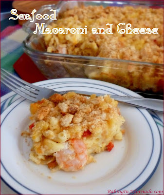 Shrimp and crabmeat take this creamy Seafood Macaroni and Cheese to another level. A few surprise ingredients add to the flavor and texture. | Recipe developed by www.BakingInATornado.com | #recipe #dinner