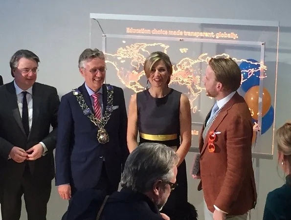 Queen Maxima attends the opening of the StudyPortals in Eindhoven. Queen wore Oscar de la Renta Sleeveless Lame Dress with Feather Hem 