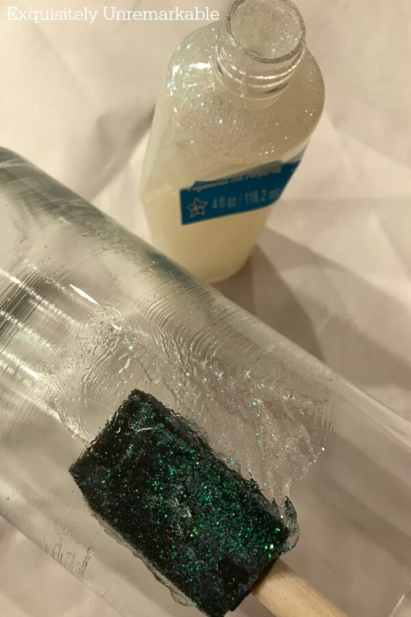 Applying Glitter Glue On Glass with a foam brush