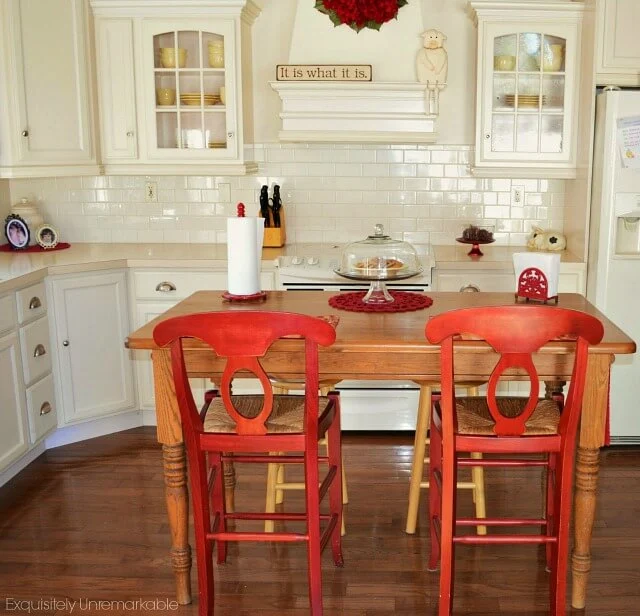 Red and white kitchen with farmhouse island