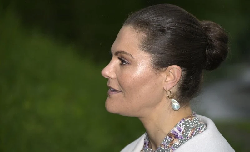 Crown Princess Victoria wore a printed bow dress from by Timo, and ivory annecy jacket from Toteme