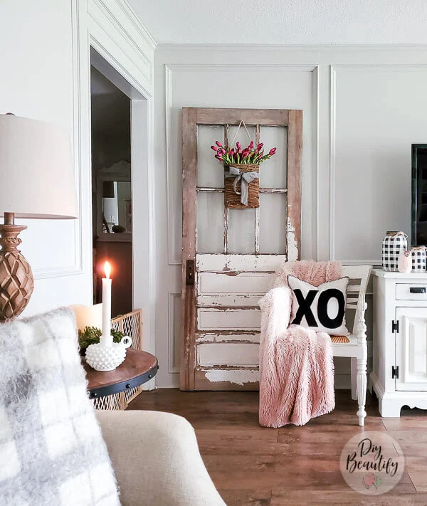 farmhouse living room with Valentines decor in blush and black