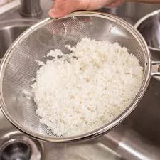 drain-out-rice-from-water