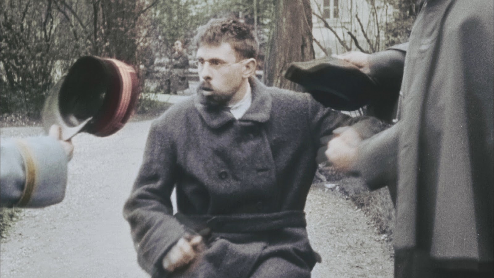 French victim of shell shock reacts to officer's cap