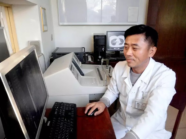 Kil Jong Chol, section chief of chest tumour laboratory of the Tumour Institute under the Academy of Medical Sciences, Pyongyang