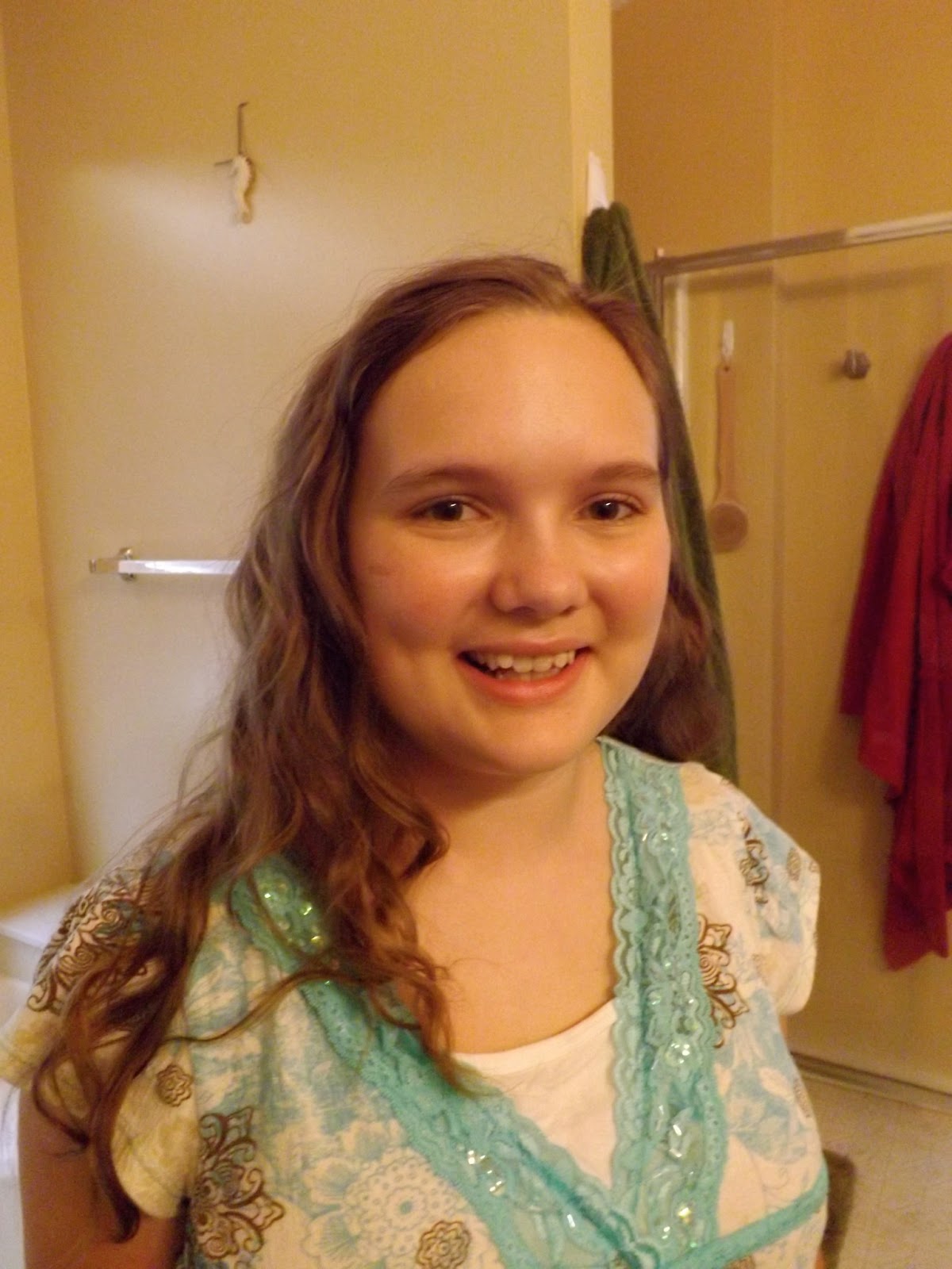 Curly Hair and Dangly Earrings