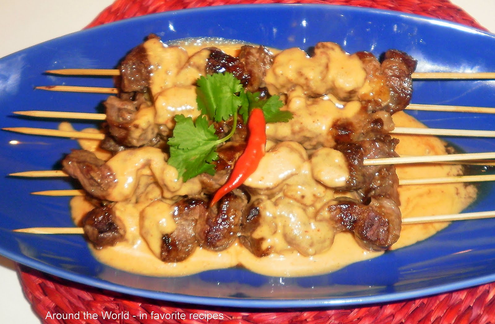 Around the World in favorite recipes Beef Skewers with Satay Sauce