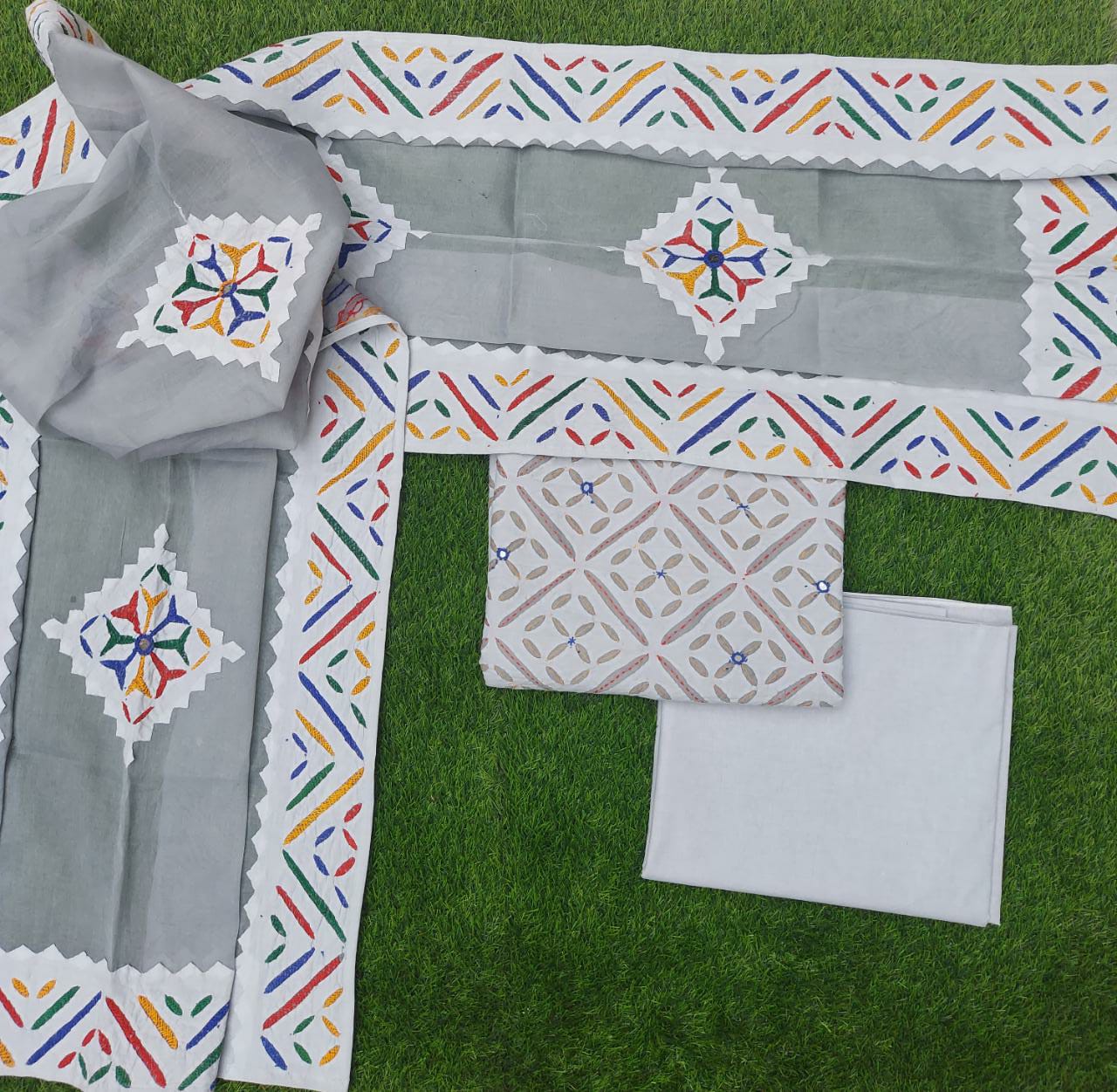 Applique dress materials with embroidery