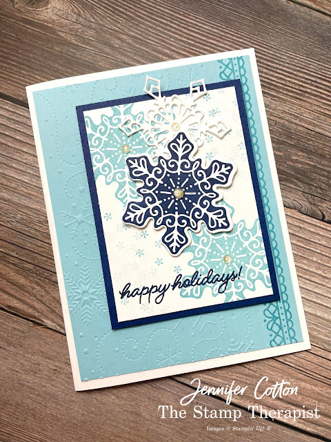 Christmas card with Stampin' Up!'s Frosted Gingerbread Bundle.  Balmy Blue and Night of Navy with snowflakes images.  Background embossed with snowflakes (Wintry) embossing folder.  Die cut detail white snowflake, too.