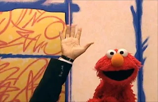 Elmo opens the door and a hand comes in for interview. Sesame Street Elmo's World Hands Interview