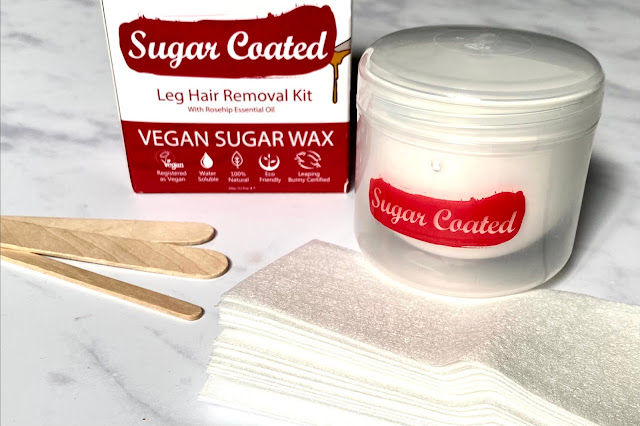 Sugar Coated Leg Hair Removal Kit and contents: applicators, wax and waxing strips